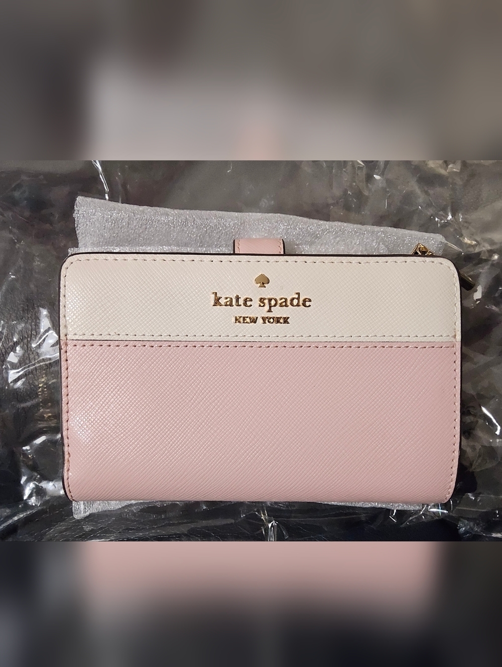 kate spade two-tone pink and cream Bi-Fold zip wallet with gold logo